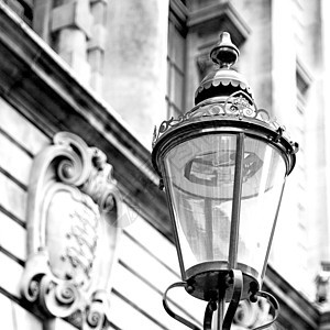 隆登灯笼和抽象光照墙中的欧洲人玻璃城市灯光金属力量邮政大理石灯泡街道电气背景图片