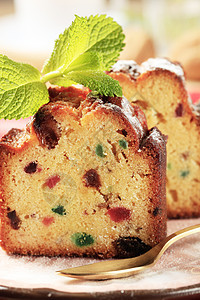 水果蛋糕切片盘子水果蛋糕面包早餐蜜饯薄荷干果横截面食物甜点图片
