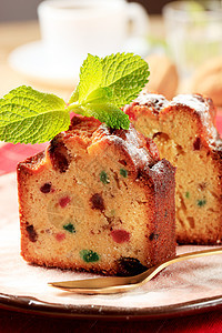 水果蛋糕切片蜜饯葡萄干干果薄荷小吃树叶早餐横截面甜点盘子图片