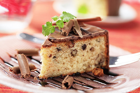 巧克力玻璃蛋糕糖浆核桃甜点坚果蛋糕巧克力卷发图片