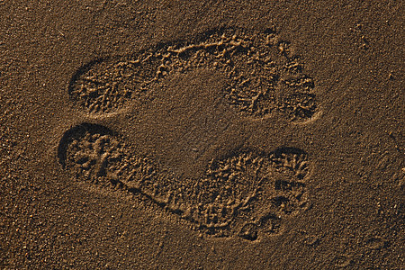 沙子上的脚印娱乐脚趾高跟鞋海滩图片