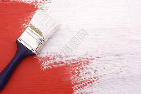 涂有白油漆的画笔刷红色图片