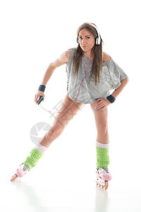 穿溜冰鞋的年轻女子女性丝袜活动绑腿口角耳机休闲轮滑滚筒幸福图片