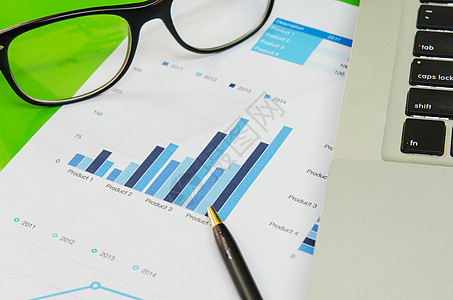 商业图和计算机金融屏幕经济推介会笔记本办公室数据投资图表药片背景图片