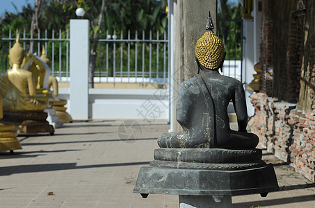 Buddha雕像场所寺庙宗教金子背景图片