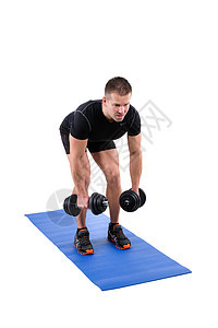 站立在邓布伦的本垒顶上 反转飞跑运动弯曲男性健身房运动员训练出汗权重成人哑铃男人图片