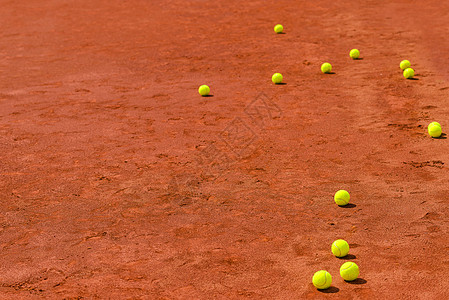 粘土场上的网球场地黄色黏土比赛优胜者闲暇竞赛训练游戏法庭图片