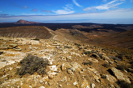 Timanfaya 岩石石头天空山和夏天图片