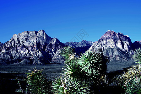 山峰红岩峡谷国家保护区 美国内华达州拉斯维加斯日落天空公园风景峡谷侵蚀沙漠国家蓝色岩石图片