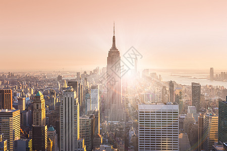 纽约市曼哈顿日落时的天线全景帝国射线旅行商业办公室太阳摩天大楼建筑观景台图片