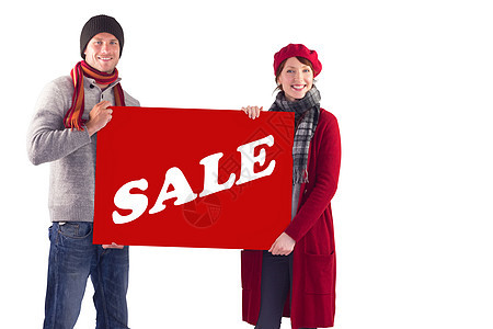 情侣持有大标志的复合图像幸福夫妻女士围巾折扣微笑销售红色零售女性背景图片