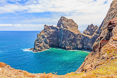 马德拉 在圣洛伦科湾悬崖波峰岩石游客海洋海景风景全景海岸线山脉图片