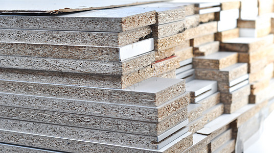 锯成的碎片上 有一块木屑板建筑木材硬木图层库存纤维木头产品贮存芯片背景图片
