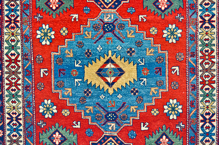 彩色羊毛手工制地毯特配蓝色装饰品小地毯材料编织工艺几何学织物手工业丝绸图片