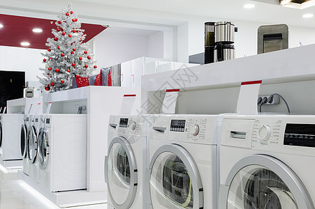 圣诞节在商店的家用电器购物中心销售团体洗衣店机器店铺电器奢华器具库存图片