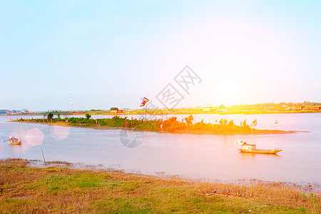 河上的船只公园钓鱼反射风景蓝色太阳旅游橙子旅行地平线图片