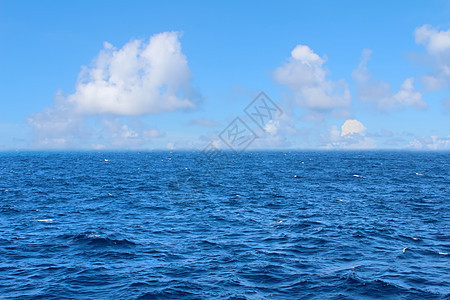 天空和海洋蓝色地平线阳光反射海滩日出海浪太阳日落背景图片