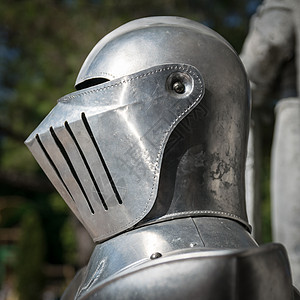 中世纪盔甲的精密细节头盔骑士金属剪裁灰色面具古董百叶窗图片