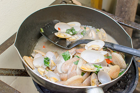 海鲜批发薯蛤美食蛤蜊食物餐厅海鲜搅拌油炸烹饪背景