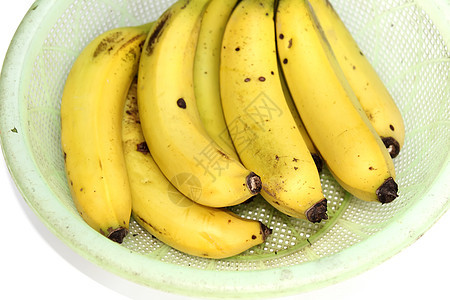 Ripe 香蕉宏观白色剪裁小路食物饮食组织热带皮肤黄色图片