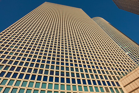 现代城市摩天大楼地貌建筑学酒店反射房子财产旅行刮刀公司城市生活天空图片