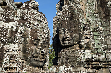 吴哥洞中拜顿神庙的面孔雕刻旅游精神宗教历史性佛教徒历史旅行高棉语岩石图片