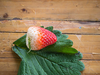 草莓种子水果红色团体绿色甜点叶子茶点食物宏观图片