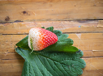 草莓团体茶点宏观食物叶子水果甜点绿色种子红色图片
