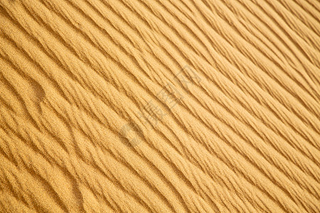 非洲萨哈拉摩洛哥沙漠中的棕色沙子图片