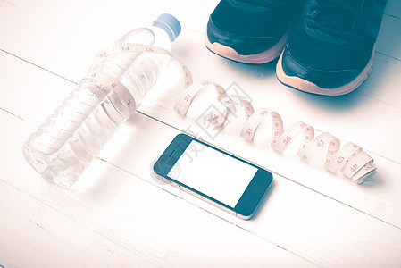健身设备陈年体型鞋类运动跑步者锻炼运动鞋测量耳机重量运动装电话图片
