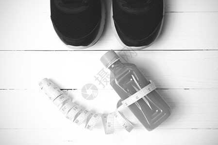 运行鞋 橙汁和电话黑白音色瓶子保健果汁营养卫生培训师水果运动装磁带重量图片