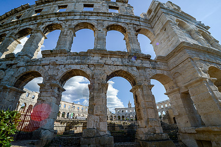 普拉克罗地亚古老的两栖剧院石头剧院柱子竞技场阳光废墟城市材料历史地标图片