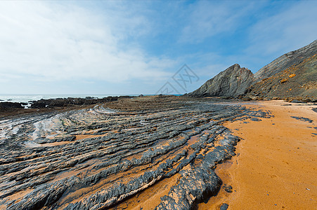 黑岩海岸线薄雾火山石头海岸峡谷悬崖气候海滩陨石图片