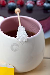 英语茶和甜点肉桂岩石糖果木头香气玻璃覆盆子食物早餐糕点图片