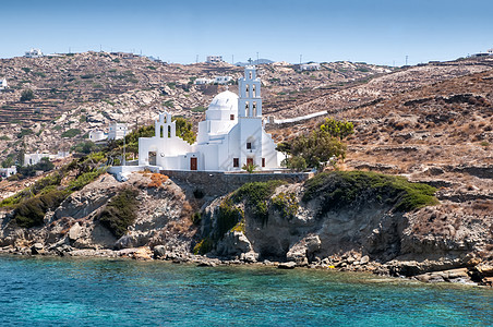 帕罗斯岛孤白教堂建筑物岩石宗教建筑学爬坡白色晴天图片