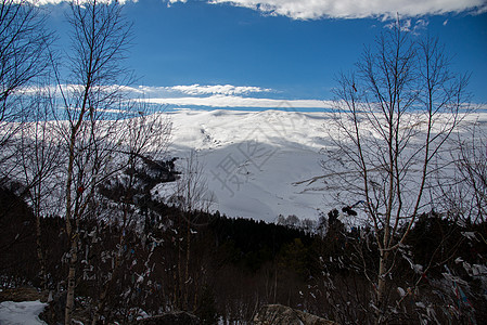 壮丽的山景地形爬坡天空荒野山峰岩石石头阳光冰川土地图片