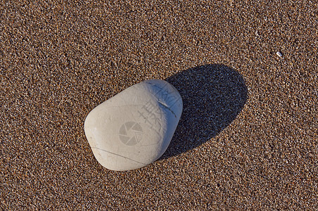 希腊科孚岛沙滩上的浮石矿物岩石白色图片