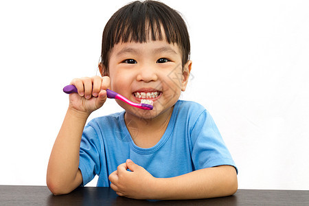 中国小女孩刷牙的中国女孩孩子喜悦学习幸福打扫刷子快乐童年预防女性图片