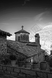 哲学家修道院 费洛索乌 迪米萨纳回廊建筑树木石头教堂教会宗教天空黑色花盆图片