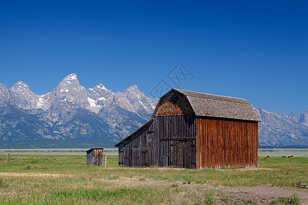 在标志性的约翰穆尔顿农场上峡谷旅行栅栏地标风景房子牧场场地草原山脉图片