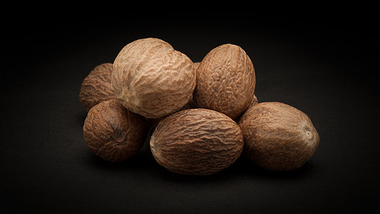 有机Nutmeg种子皮背景图片
