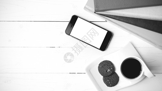 咖啡杯加饼干 手机和书卷黑白可乐钥匙杯子网络眼镜咖啡桌子笔记本工作细胞电话背景图片