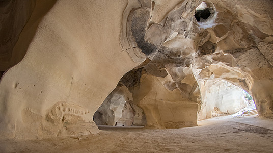 以色列贝特古夫林洞穴洞穴游客旅游旅行石头背景图片