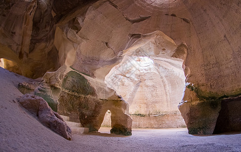 以色列贝特古夫林洞穴石头旅游游客洞穴旅行背景图片