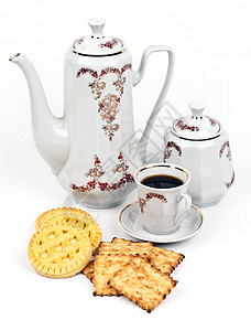 咖啡服务和配有饼干的咖啡盘子白色咖啡店婚礼庆典工作蛋糕号码服务台自助餐图片