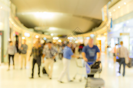机场膳宿区背景模糊的背景游客商业人群队列车站旅行购物乘客飞机旅游图片