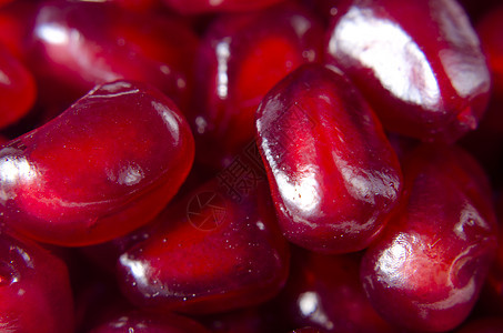 石榴种子本底热带团体工作室健康水果红色水平粉色宏观生活图片