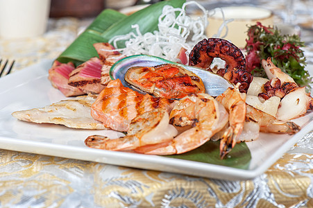 海鲜混合菜盘柠檬餐厅鱿鱼市场奢华乌贼盘子贝类食物龙虾图片