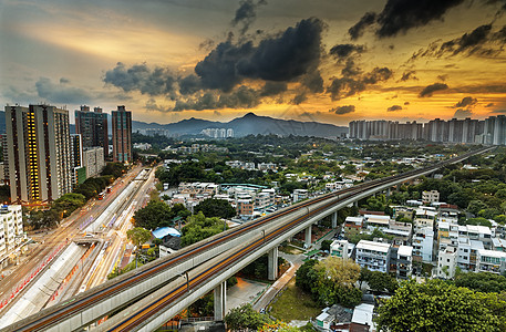 香港市中心市区和日落高速火车长平活力技术交通穿越辉光街道卡车场景城市射线图片