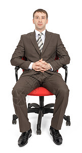坐在椅子上的商务人士男性通勤者老板套装人士银行商务金融背景图片